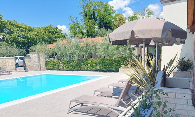 Bardolino Apartment | CASA PERGOLA 1 - Elegant apartment for 6 people- swimming pool and parking space