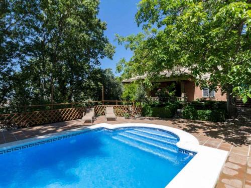 Niguelas Villa | Casa rosa del romeral