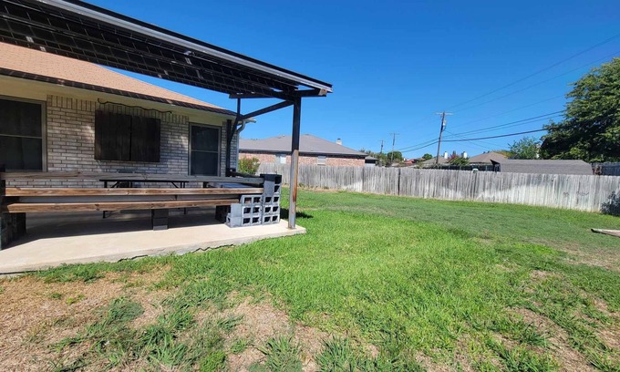 Killeen House | Centrally located family-sized home with huge patio & back yard.