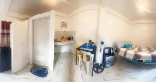 Coron Town Proper Apartment | Centrally located studio with AC and kitchenette