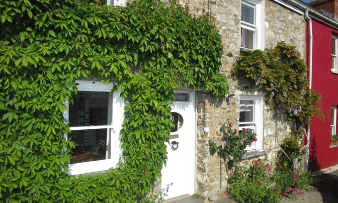 St Dogmaels Cottage | Character cottage in heart of village with stunning estuary view and garden