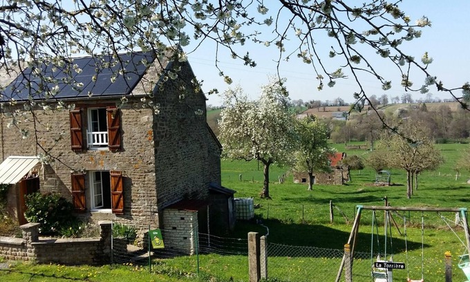 Tinchebray-Bocage Cottage | Charming Rural Home with Garden, Fireplace, Near Mont St Michel & Scenic Hiking!