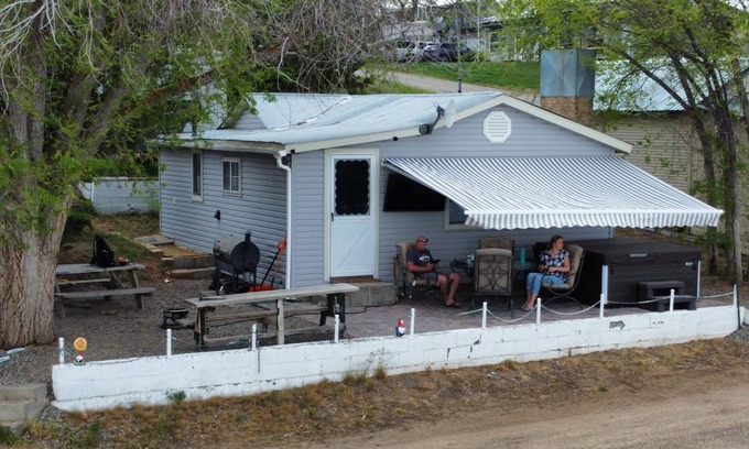 Bellevue Cabin | Charming 2 bedroom waterfront cabin at West Magic Id. 83352 with hot tub.