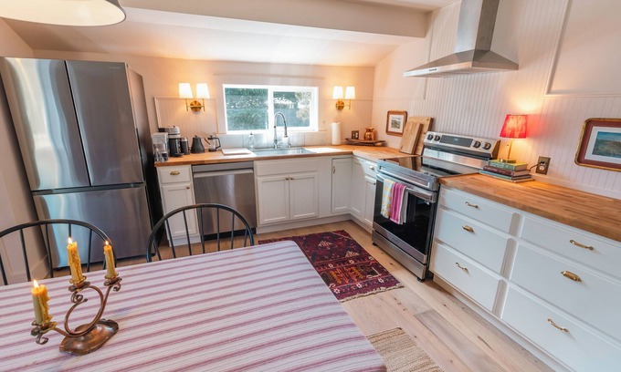 Seaside Cottage | Charming and cozy coastal escape steps from the beach. Pet friendly!