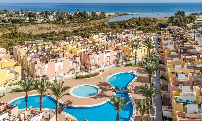 Puerto Rey Apartment | Charming Apartment with Pool