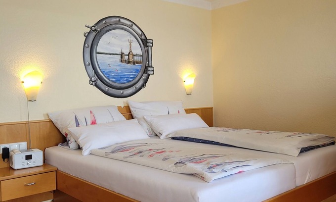 Hagnau Apartment | Charming "Backbord" apartment - with lake view and sunbathing lawn right by the water