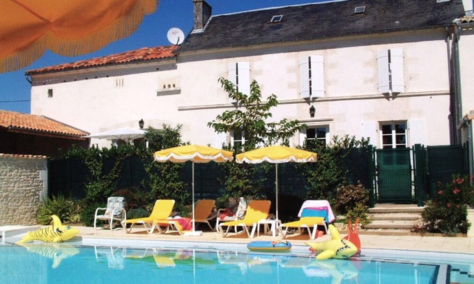 Saint-Cybardeaux Cottage | Charming Cottage with Pool, Fireplace, and Garden in Vineyard Estate