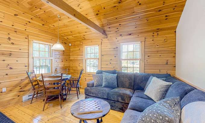 Lincolnville Cabin | Charming log cabin with firepit, lovely interior, and cozy patio/deck