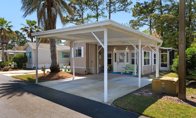 Upper Grand Lagoon Cottage | Charming pet-friendly cottage in a gated resort with amenities on the east end of Panama City Beach!