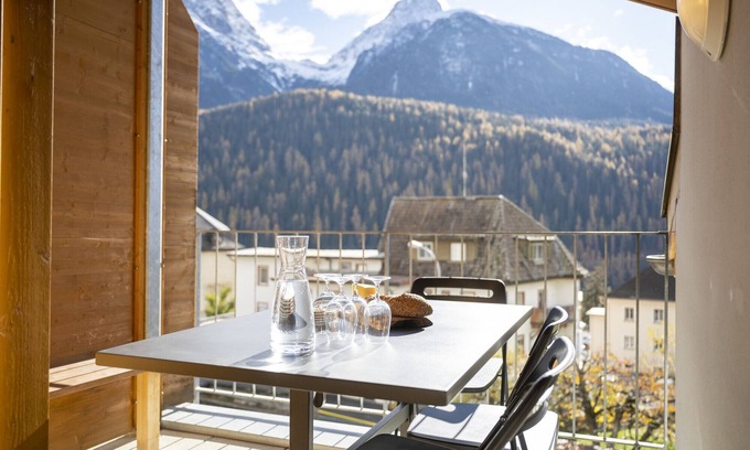 Engadin Scoul Apartment | Chasa Bagnera 174: modern 3 1/2 -room attic apartment right next to the Engadin Bad Scuol