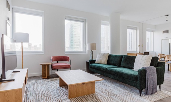 Central New York City Apartment | Chic Midtown 2BR w/Gym, W/D & A/C, near Rock Ctr, by Blueground