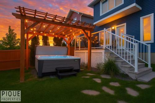 Southwest Edmonton Apartment | Chic Retreat with Hot Tub - King Bed - Fireplace - WEM