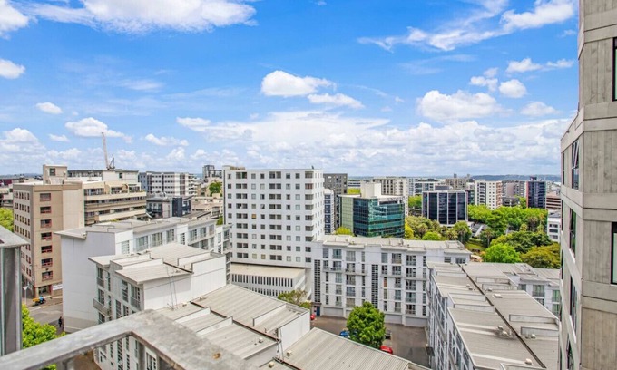 Grafton Apartment | City Verve 2BR Apt with City Views and Wi-Fi
