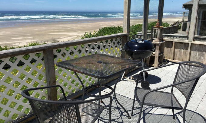 Edgewater Shores Cottage | Classic Honeymoon Beach Cottage. Private, Romantic, Oceanfront. Pet friendly.