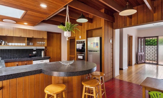 Sandy Bay House | Classic Retro Home Steps from Sandy Bays Best