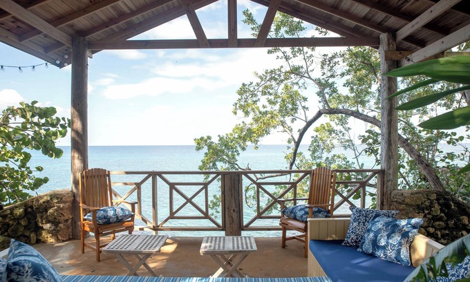 Orange Bay Villa | Cliffhouse - 5br villa - stunning sunset, snorkeling, tennis, seaside cuisine