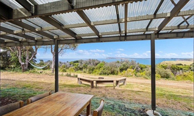 Powlett River House | Clifftop Cocoon Swing into Scenic Sea Views