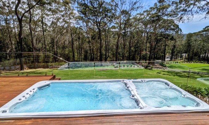 Kincumber South House | Coastal bush retreat> Space,Nature,Relaxation, Dual swim spa and fireplace