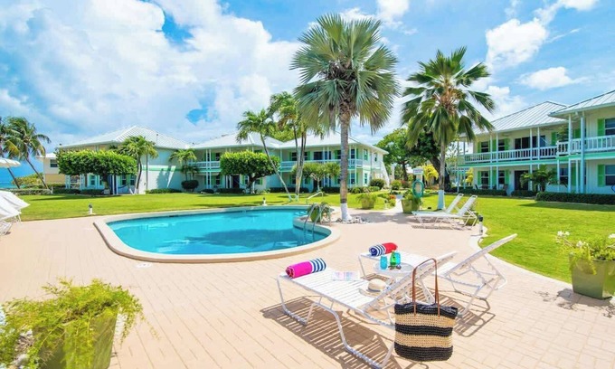 Seven Mile Beach Condo | Cocoplum #1 Oceanfront Condo on 7 Mile Beach
