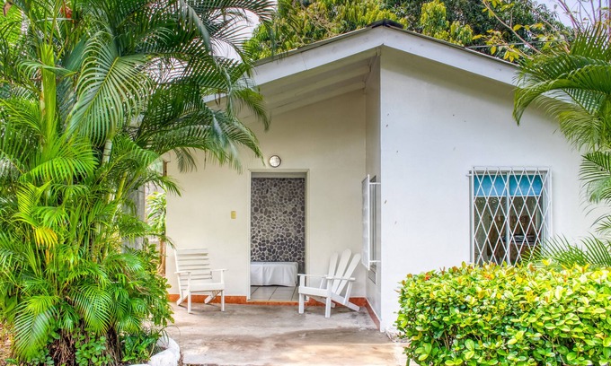 Puntarenas Cottage | Colorful getaway w/ shared pool/gardens & a great beachfront location!