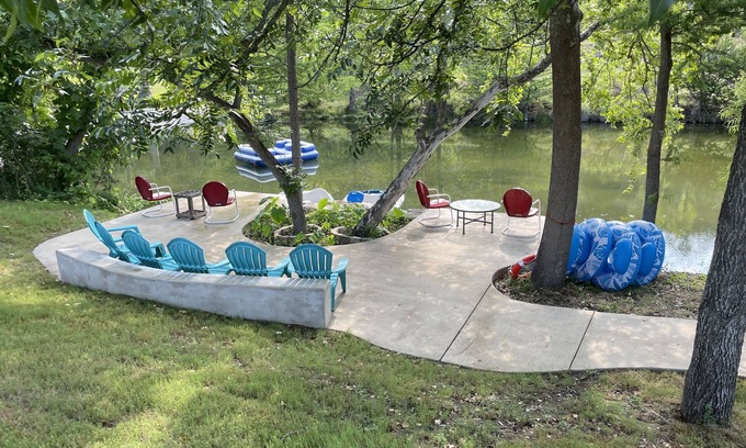 Ingram House | Colorful waterfront retro compound, airstream kitchen, hot tub, media barn!