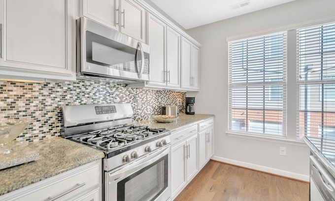 Richmond Condo | Come Home to Waterfront Living at Rockette's Landing by RedAwning