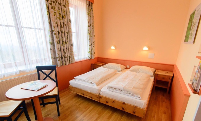 Sirnitz-Sonnseite House | Comfort Vierbettzimmer, Halbpension - Jufa Hotel Hochrindl