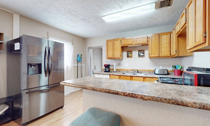 Ingleside House | Comfortable home with spacious living room, kitchen & dining area