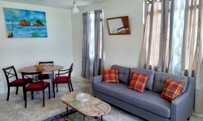 Calibishie House | Comfortable, local home with A/C and private verandah
