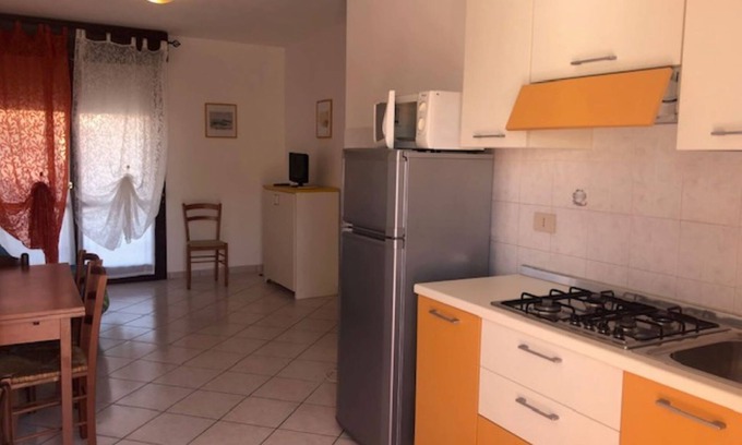 Rosapineta Apartment | Comfy 3 room flat in Rosolina with shared pool