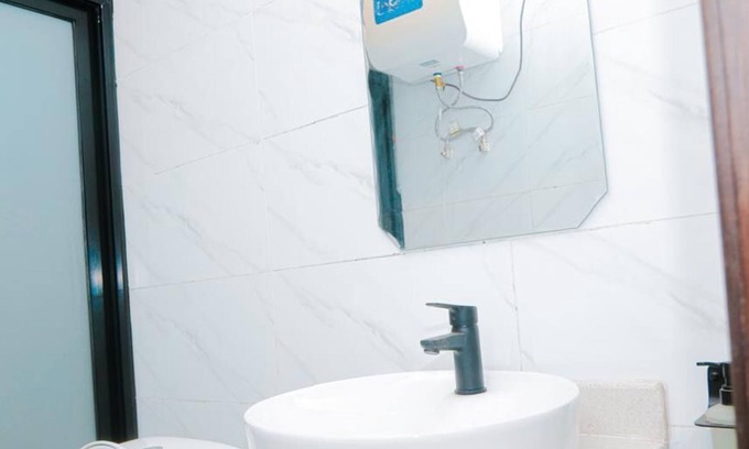 Ngiri-Ngiri Apartment | Comfy hotel suites in vibrant Kinshasa with WiFi, AC