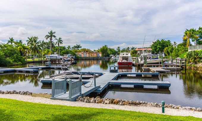 Royal Harbor Condo | Condo with Boat Dock, 1.5 miles to beach, and 2 blocks to 5th Avenue!