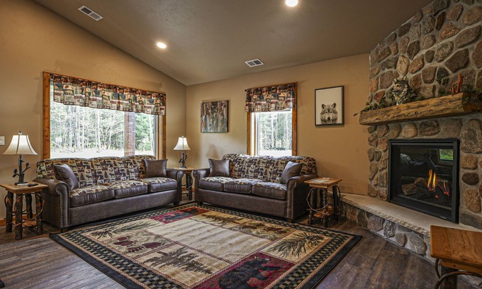 Conover House | Contemporary dog-friendly cabins with hot tub, fireplaces, patios, & game room
