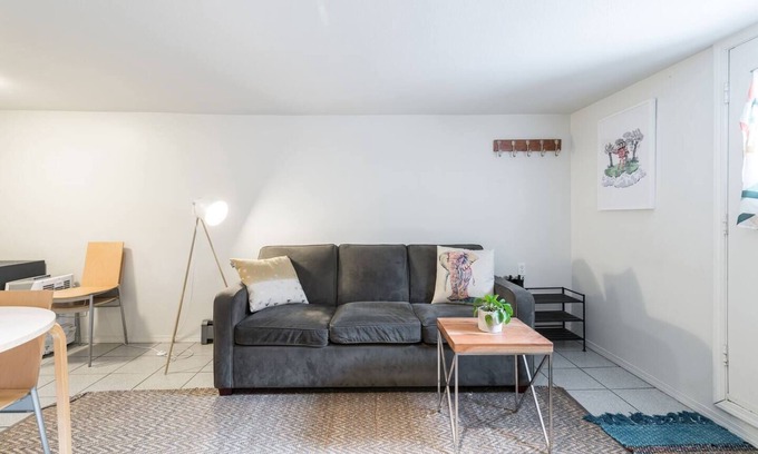 Kensington-Cedar Cottage House | Cool, cozy and modern space with a garden patio to enjoy meals in sunny weather.