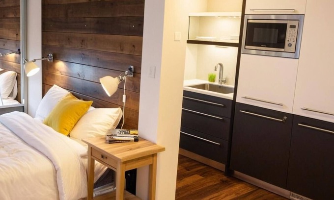 Wesoła Zachod Apartment | Copernicus Studio: Tranquil Balcony, Modern Comfort & Historic Krakow