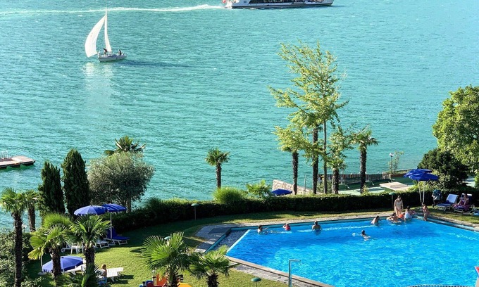 Bigogno Apartment | Cosy apartment for 4 guests with WIFI, pool, A/C, TV, balcony, panoramic view and parking