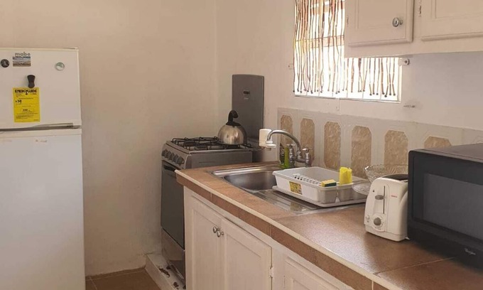 Blue Waters Apartment | Cosy one bedroom apartment on the beautiful south coast, close to Accra beach.