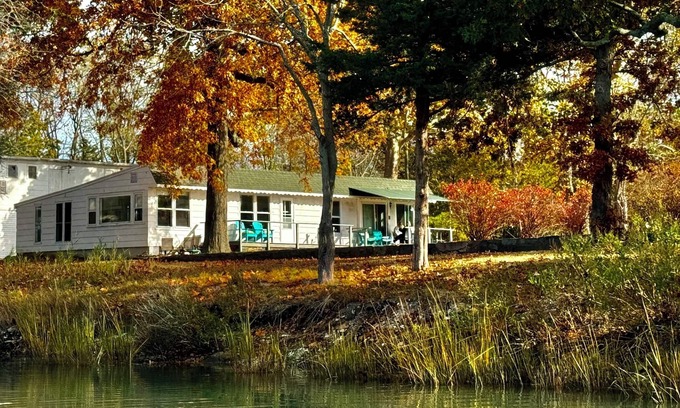 Pipes Cove Cottage | Cottage on Beach front Estate with Dockage .Walk to Village