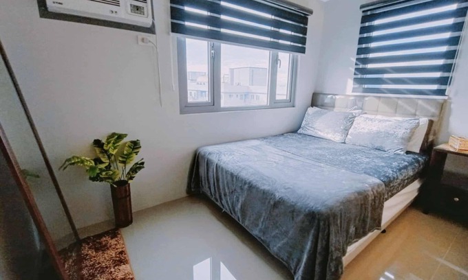 Santo Cristo Condo | Cozy 1-bedroom condo in terrific Quezon City with AC, WiFi