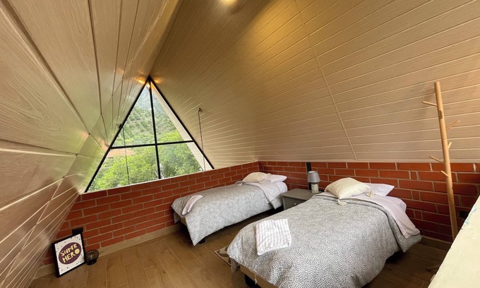 Lligua Cabin | Cozy 2-bedroom cabin in peaceful Patate with WiFi