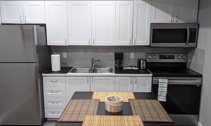 Regina Apartment | Cozy 2BR basement suite near the airport & highway—for every stay!