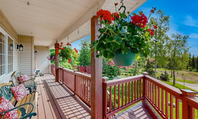 Mid-Hillside Apartment | Cozy apartment with large deck with views, hot tub & wood stove