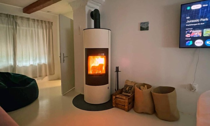 Furstenfeldbruck District House | Cozy Bavarian home with fireplace and fully equipped kitchen.