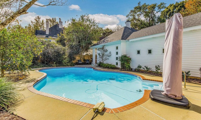 East Hill House | Cozy Carriage House with Pool, Bikes, and Charming Neighborhood