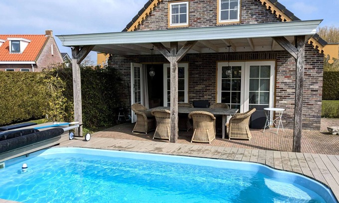 Tzummarum House | Cozy cottage with heated pool, garden and covered terrace