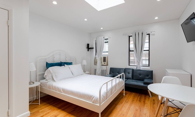 Midtown South Apartment | Cozy Light-filled Skylight Studio in Chelsea