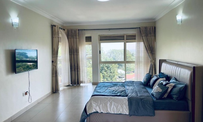 Entebbe House | Cozy Private Rooms in a furnished Penthouse with lake view
