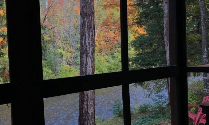 Ellis Township Cabin | Cozy river cabin, steps away from blue ribbon fishing hiking trails.