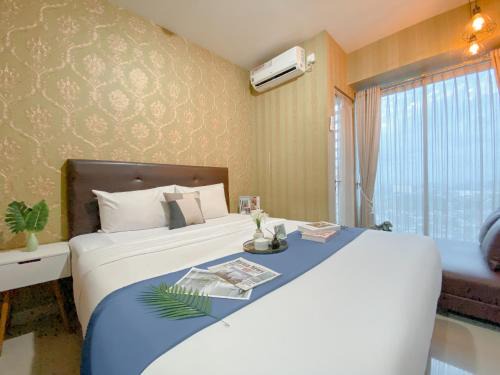 Bekasi Barat Apartment | Cozy Studio Apartment Grand Kamala Lagoon By Travelio