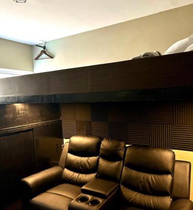 Binan City Apartment | Cozy Studio near Nuvali, Enchanted Kingdom - Private Cinema with Netflix & Disney Plus with Free Pool Access